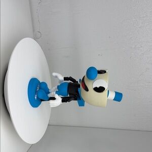 MugMan Articulated flexi children’s toy with stand.